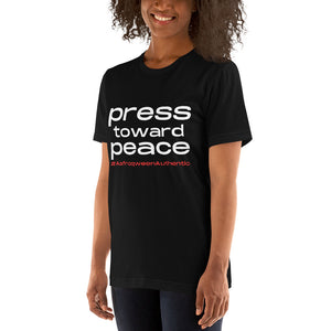 AQA Unisex press toward peace story tee
